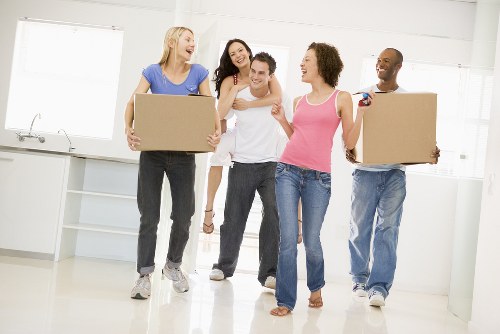 Furniture collection team handling bulky items in Richmond residential area