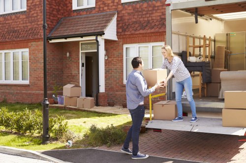 Local man with van moving furniture efficiently in Richmond