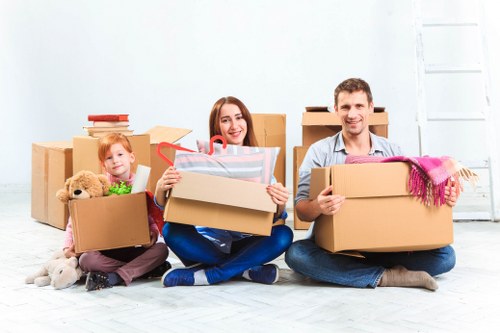 Trained moving staff using protective equipment during a house move