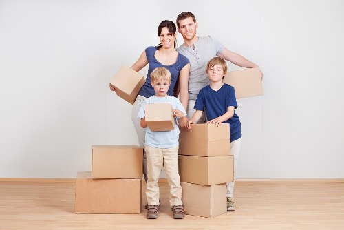 Professional movers loading belongings into a removal van in Richmond