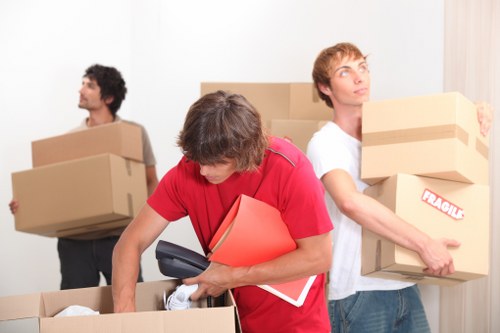 Packing and moving items into a van for a Richmond relocation