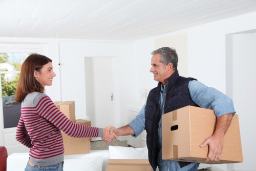 Packed boxes and furniture ready for a Richmond moving van