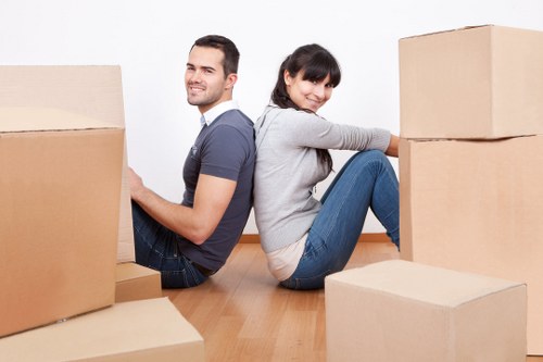 Local moving team handling boxes in Richmond street
